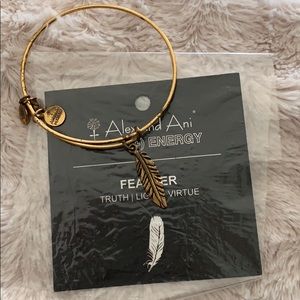 Barely used Feather Alex and Ani in gold tone.